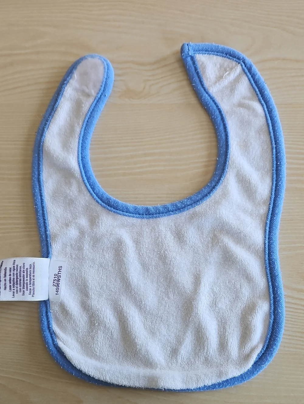 BabiesRUs Striped Bib with Blue Trim and Multicolor Lines